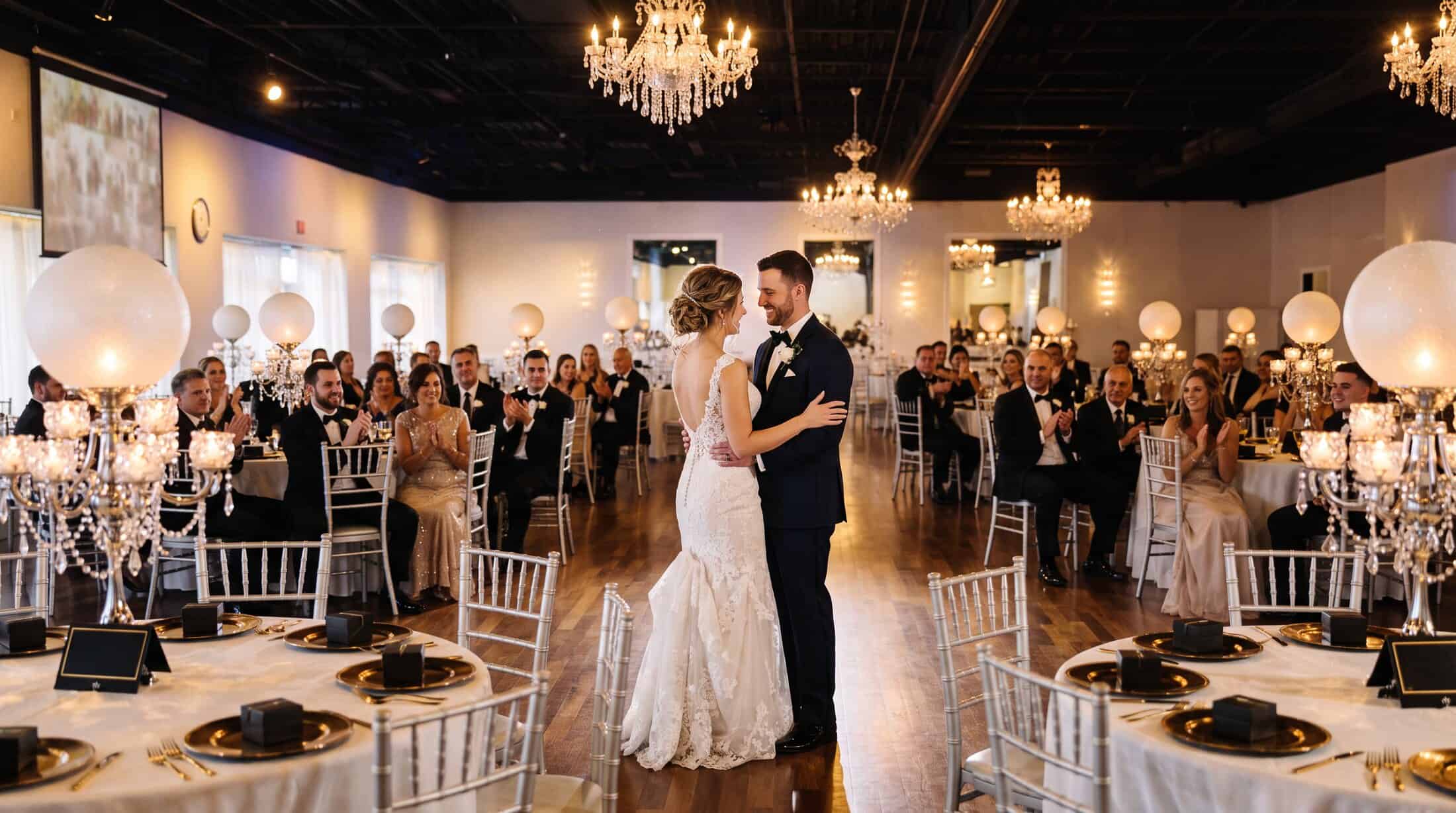 First dance at a black-tie wedding at Pizazz Ballroom