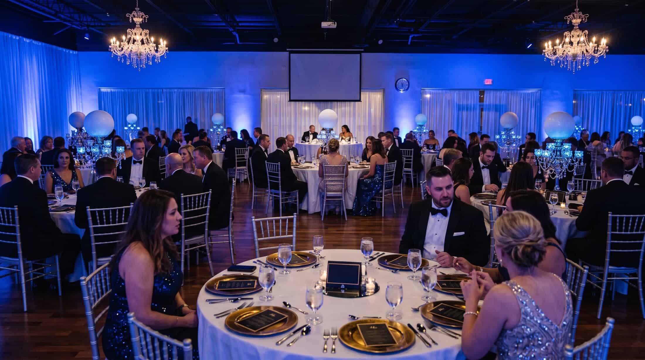 Sapphire LED uplighting at a Pizazz Ballroom gala